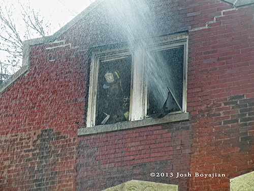 fire hose spray through window