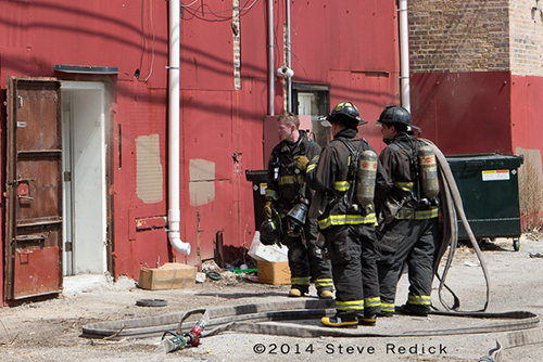 firemen at fire scene