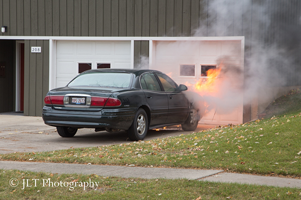 car fire in driveway