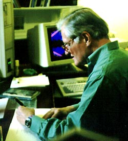 John Ashbery signing a book