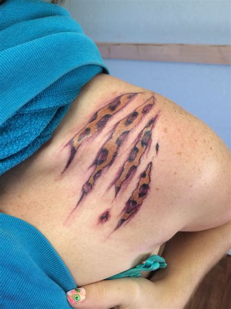 Leopard print tear tattoo done by Doug Westcott the Misfit Artist at Immortal Ink in Rome NY ...