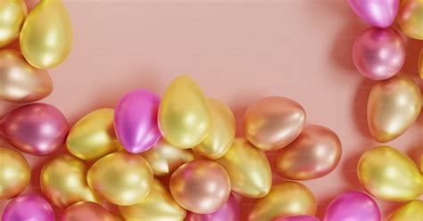 A pink and gold background with balloons in the shape of a rectangle ...