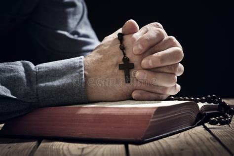 Praying Hands on an Open Bible Stock Photo - Image of colour, education: 13880184