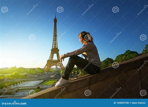 Girl Looking at the Eiffel Tower in Sunrise Time Stock Photo - Image of paris, outdoor: 104859708