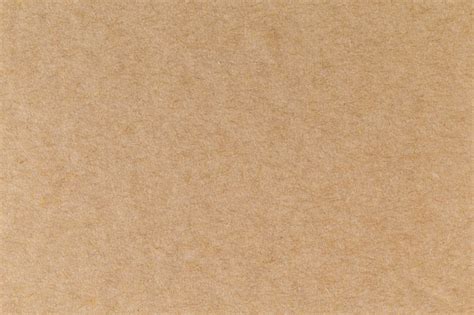 Premium Photo | Brown eco recycled kraft paper sheet texture cardboard background.