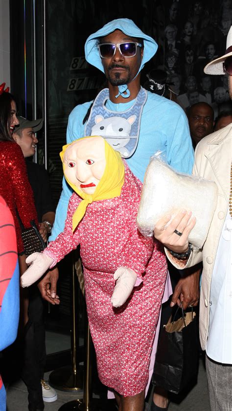 Snoop Dogg dressed as a giant baby attached to the back of an old woman : r/funny