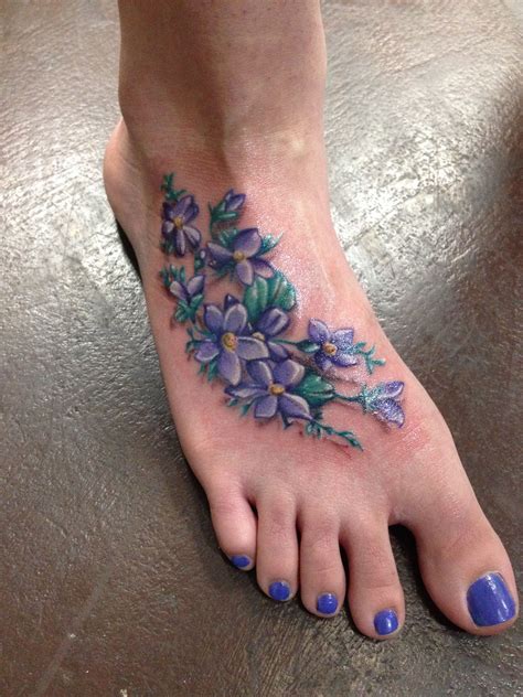 Flower tattoo on foot by Chris Burnett Evangel ink tattoo Hesperia ca ...