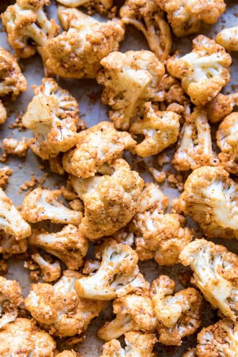 Spicy Cauliflower Cheese Bites with Tahini Ranch. - Half Baked Harvest