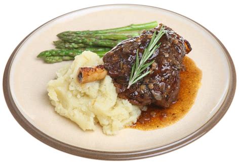 Roast Lamb Shank Dinner stock image. Image of gravy, potatoes - 15510497