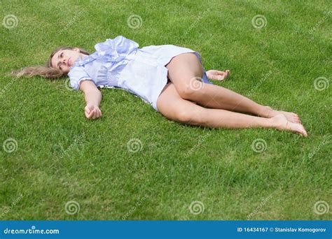 Beautiful Girl Lying Down of Grass Stock Image - Image of park, dreams: 16434167