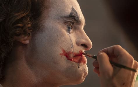 How Joker got his iconic hair and makeup | SYFY WIRE