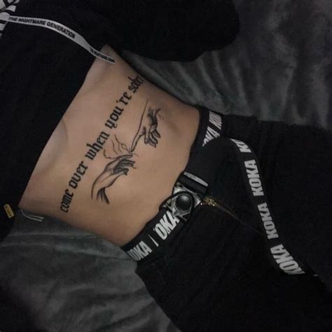 Stomach Tattoos for Women in 2020 | Grunge tattoo, Tattoos, Ribcage tattoo