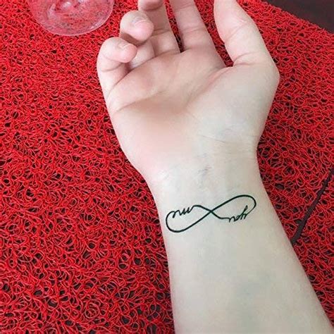 Discover 84+ infinity symbol tattoos best - in.cdgdbentre