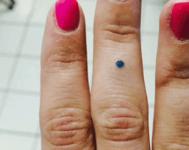 What Does A Single Dot Tattoo Mean | TattooAdore