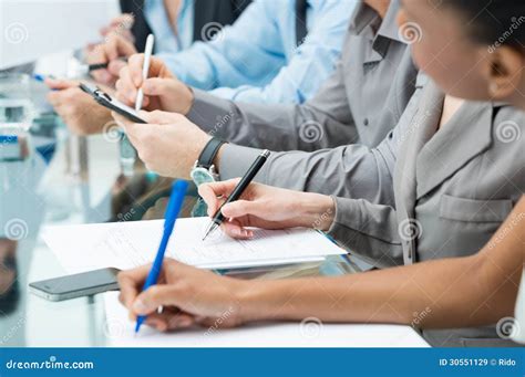 Business People Writing Notes in Meeting Stock Image - Image of meeting ...