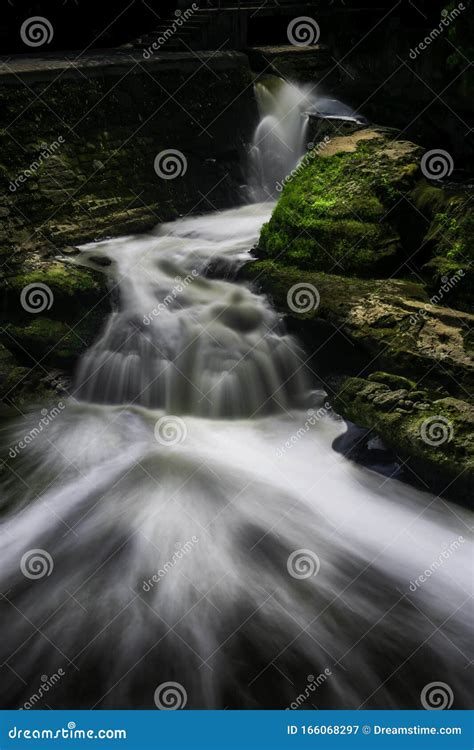 Tranquil Waterfalls from a Dam Stock Image - Image of dramatic, rocks: 166068297