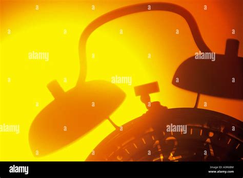 Alarm clock and sunrise Stock Photo - Alamy