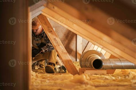 Air Ventilation Installer Working in Attic 24627583 Stock Photo at Vecteezy