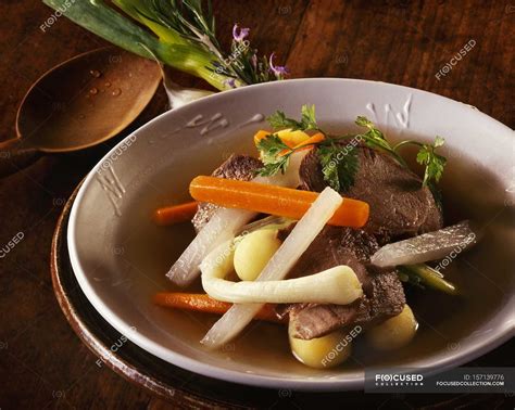 Pot-au-feu on white plate — meal, backdrop - Stock Photo | #157139776