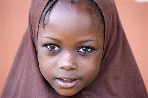 Togo, Lomé, Muslim girl – License image – 70375739 lookphotos