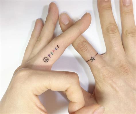 40 Tiny Finger Tattoos That Define Perfection - TattooBlend