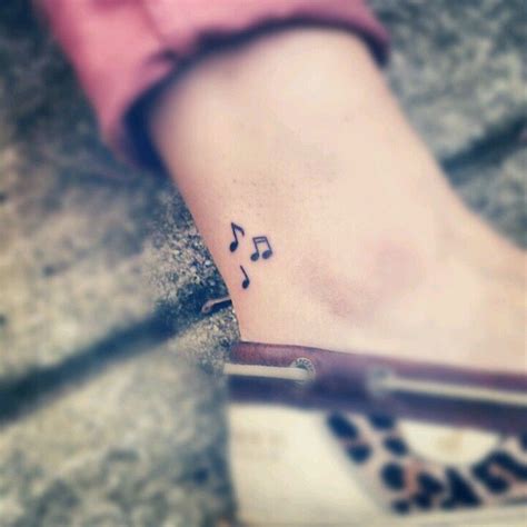 i don't usually go for musical notes as tats, but these are cute Unique Tattoos For Women ...