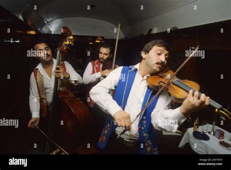 Hungarian gypsy musician performing traditional gypsy music on the Orient Express Train near ...