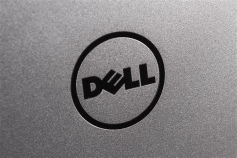 Has anyone removed this logo from their xps 13/15? How would it look? : r/Dell