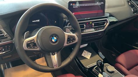 red interior car bmw - Myong Yost