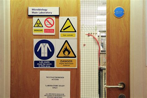 Microbiology Laboratory Door Photograph by Sotiris Zafeiris/science Photo Library - Pixels