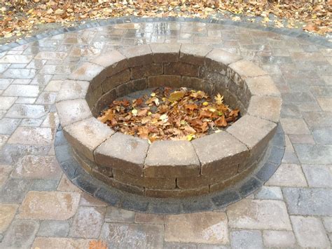 Fire Pit in the woods...Brick paver patio and tumbled paver stone fire pit. All Natural ...