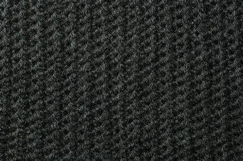 Premium Photo | Black knitted wool texture can use as background.