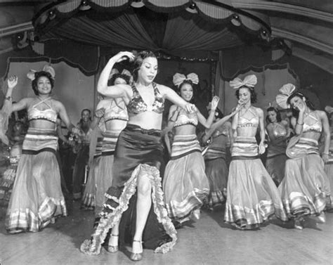 Dancers performing onstage at the Cotton Pictures | Getty Images