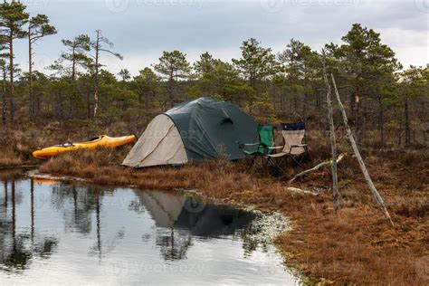 Camping and Tenting by the Lake 15184278 Stock Photo at Vecteezy