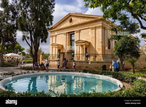 Upper Barrakka Gardens in Valletta, Malta, city garden with fountain and former Garrison Chapel ...