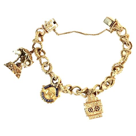 Gold Charm Bracelet at 1stDibs