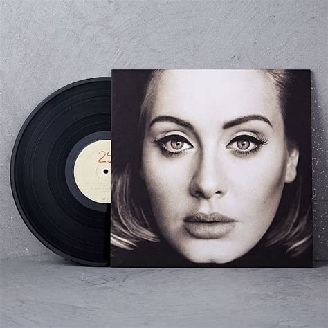 a black and white photo of a woman's face on a vinyl album cover