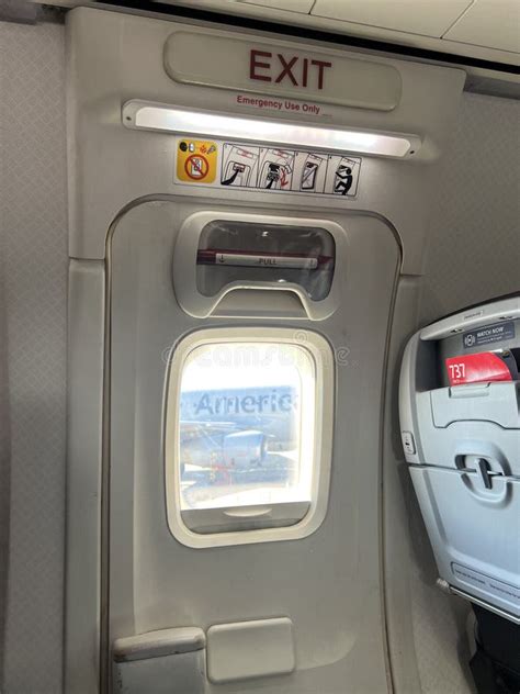 Airplane Emergency Exit Door Editorial Stock Image - Image of travel, inside: 258412794