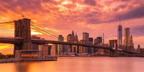 Sunset over Brooklyn Bridge in New York City Skyline Panorama Photograph by Ranjay Mitra | Fine ...