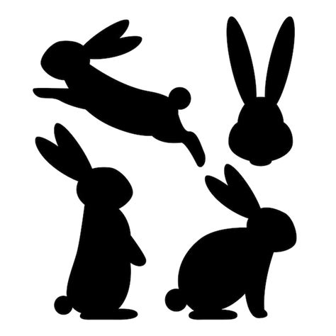 Premium Vector | Set of silhouettes of rabbits sitting standing and jumping