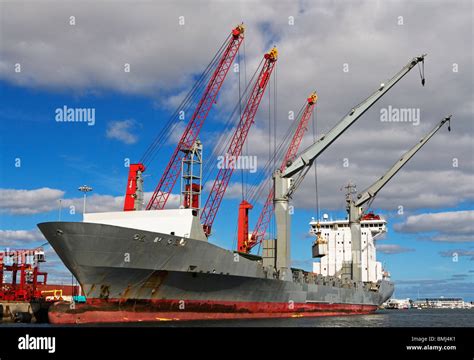 Cranes on cargo ship Stock Photo - Alamy