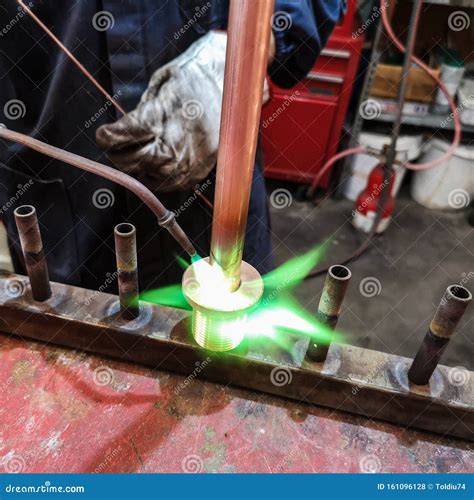 Soldering of Brass Fittings on Copper Pipe Stock Photo - Image of propane, joint: 161096128