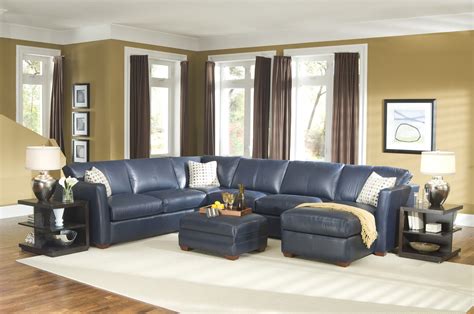 furniture-blue-leather-sectional-sofa-and-white-cushions-added-by-square-ottoman-and-white-rug ...