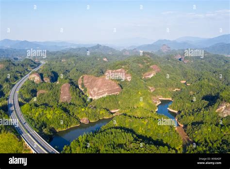 aerial view of expressway and danxia landform Stock Photo - Alamy