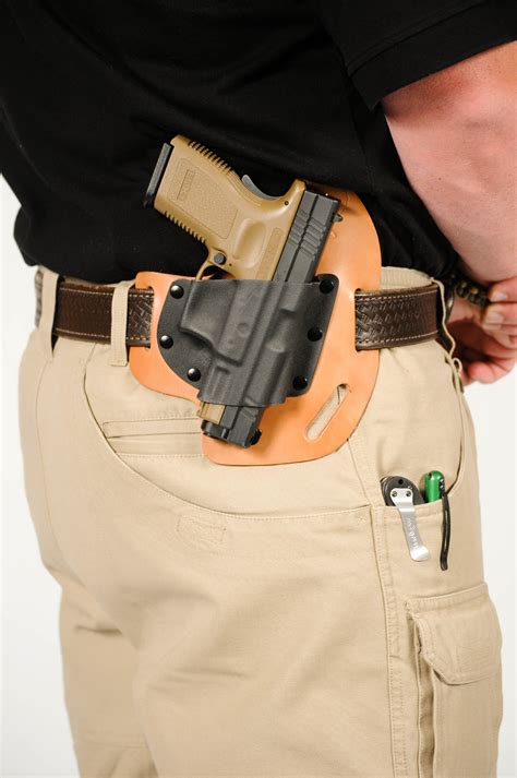 CrossBreed Concealed Carry Holster Does Double Duty