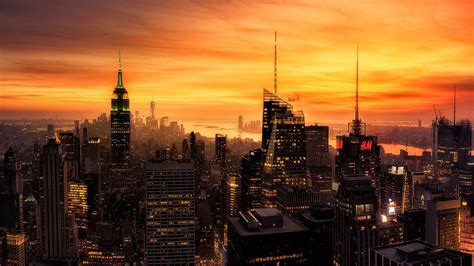 City With High Rising Buildings Under Yellow Sky During Sunset HD New ...