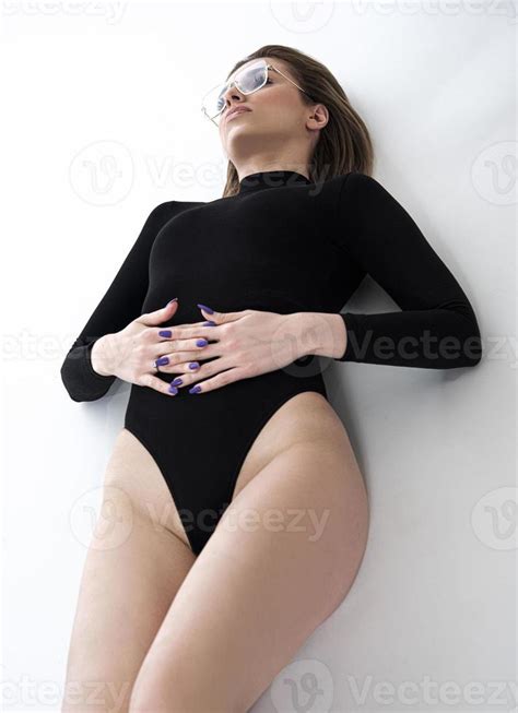 Young woman suffering from menstrual cramps at home. Gynecology 17155767 Stock Photo at Vecteezy