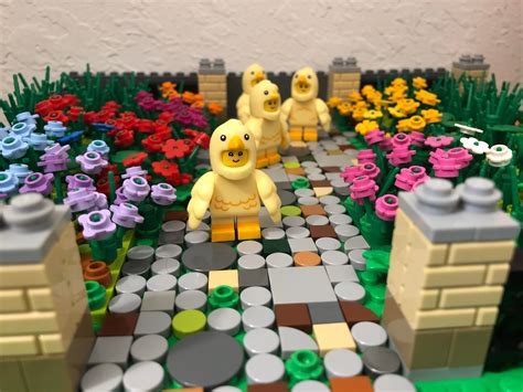 Letting the chicks play in the flower garden. : lego