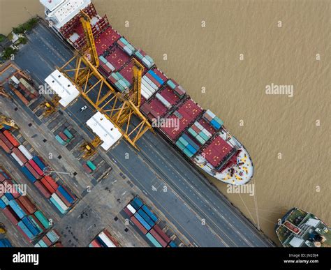 Aerial view of cargo ship port Stock Photo - Alamy