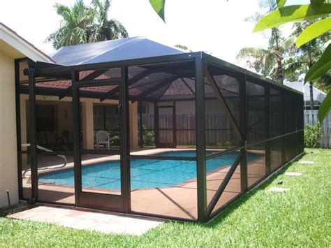 Ft. Myers Residents Enjoying a Cold Drink in Screened Pool Enclosures - Accurate Aluminum - Call ...